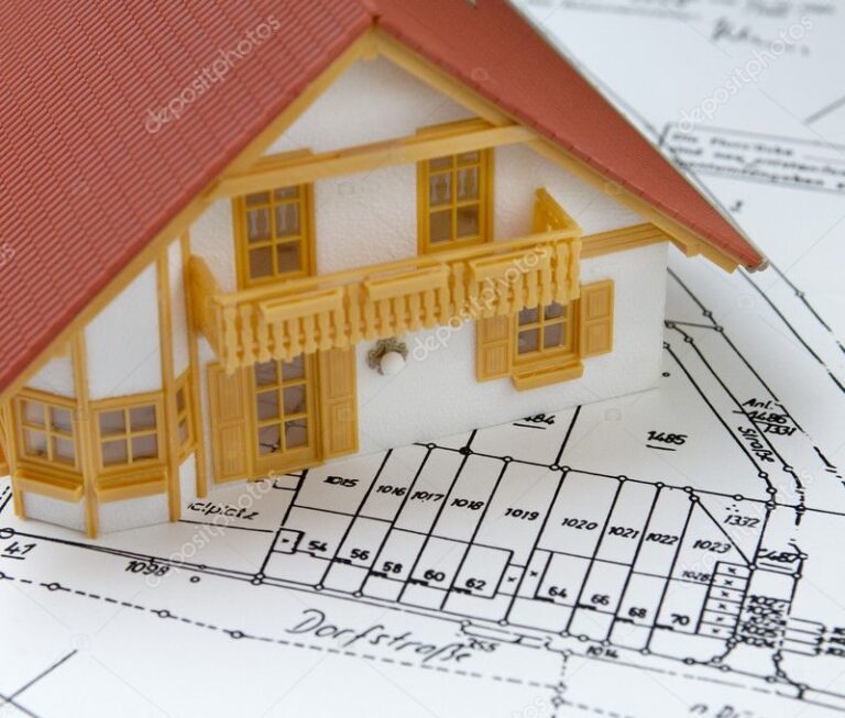 depositphotos_4024670-stock-photo-house-model-on-ground-plan-800x680